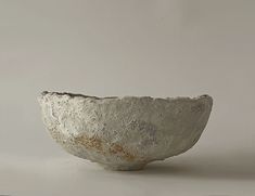 a white bowl sitting on top of a table