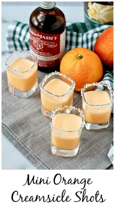 mini orange creamsice shots on a table