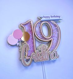 a cake topper with the number 90 on it