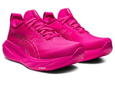 the asics running shoe is bright pink