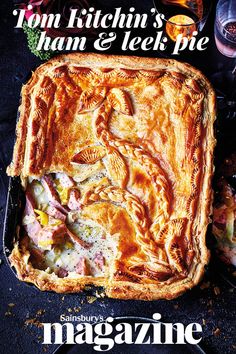 a large pie sitting on top of a black plate