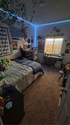 the bedroom is decorated with lights and stuffed animals