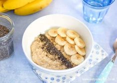 a bowl of oatmeal with bananas and chia seeds next to it