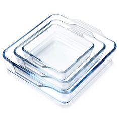 three square glass dishes stacked on top of each other