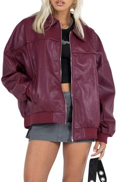 Go for an edgy look in this faux-leather bomber jacket sporting a glossy texture, an oversized fit and casual-cool ribbed trim. Front zip closure Spread collar Ribbed cuffs and hem Front welt pockets Lined 55% rayon, 45% polyester Dry clean Imported Faux Leather Outerwear With Pockets For Streetwear, Trendy Oversized Varsity Jacket With Ribbed Cuffs, Trendy Leather Jacket With Zip Fly For Streetwear, Solid Leather Jacket With Zipper For Streetwear, Trendy Fall Varsity Jacket, Trendy Long Sleeve Varsity Jacket With Zipper Closure, Sporty Leather Jacket With Zipper Closure For Winter, Streetwear Faux Leather Biker Jacket With Zipper Closure, Fall Leather Jacket With Ribbed Collar