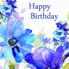 a birthday card with blue flowers and green leaves