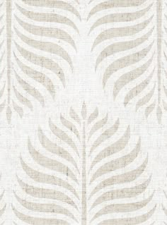 a beige and white wallpaper with leaves on it