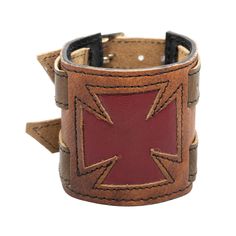 IF YOU REQUIRE A LARGER QUANTITY THAN IS SHOWING PLEASE CONTACT US WE MAY BE ABLE TO ACCOMMODATE YOU *   Wide leather wrist cuff hand made from upcycled and new leather in our workshop      Devon, England *   This cuff has two buckles securing it in place, easily adjustable.      Brown Leather Cuff - Red Leather Iron Cross *   Due to being handmade from up-cycled leather the shade and texture may vary. *   Postage is included with all items dispatched in the      UK *   If you change your mind f Leather Wrist Cuff, Bracelet Arm, Chemo Headwear, Iron Cross, Devon England, Leather Wristbands, Buckle Bracelet, Wrist Cuffs, Lady Biker