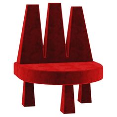 a red chair with three legs on it