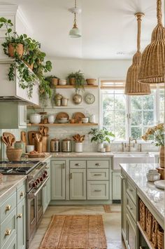 a kitchen filled with lots of green cabinets