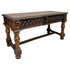 an old wooden table with carvings on it's sides and two legs, against a white background