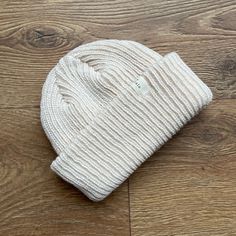 Knitted beanie by Lala. Super soft cotton and ribbed making for a snug and comfy fit. Can be worn turned back for babies or folded down for a toddler. It’s simple design and neutral colours look great with any outfit, making it a versatile piece for your little one's wardrobe. Colour: Ivory, Beige + Mocha Size: One Size (6 - 24 months) Cool wash 30 Unisex Cozy Adjustable Soft Knit Beanie, Cozy Knit Bonnet, Cozy Soft Knit Beige Bonnet, Cozy Beige Soft Knit Bonnet, White Warm Casual Bonnet, Casual Warm White Bonnet, Slouchy Soft Knit Beanie For Everyday, White Cozy Everyday Beanie, Adjustable Cozy Beige Beanie