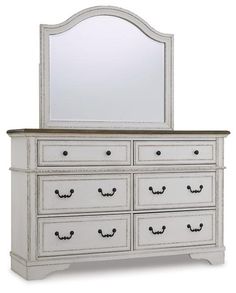 a white dresser with a mirror on top and drawers below it, against a white background