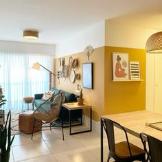 a living room filled with furniture and decor