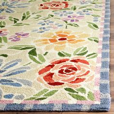 a colorful rug with flowers on it