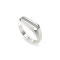 a white gold ring with diamonds on it