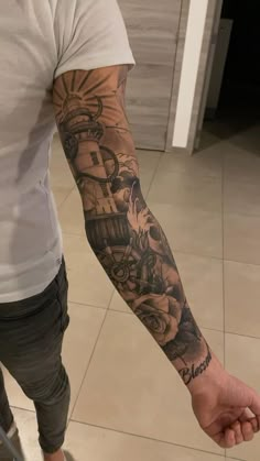 a man with a tattoo on his arm