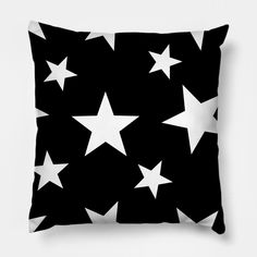 a black and white pillow with stars on it