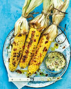 grilled corn on the cob with salsa and sour kraut dips