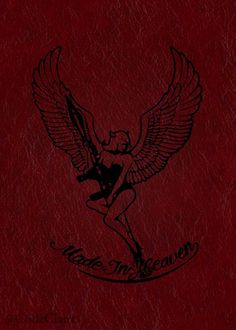 a red leather book with an image of a woman holding a guitar and wings on it