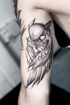 an owl tattoo on the arm and leg is shown in black and grey ink, while it