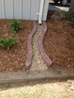 a brick pathway leading to a house