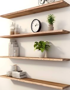 three wooden shelves with plants, books and a clock