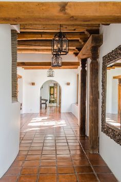 the hallway is clean and ready for guests to use it as an entrance way into the house