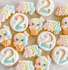 decorated cookies with numbers and faces on them