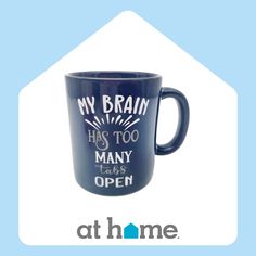 a blue coffee mug with the words my brain has too many tales open