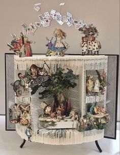 an altered book is decorated with many different things