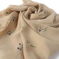 * Chiffon shawl with colorful embroidery, shawl for a wedding * Scarf made of light, airy chiffon in beige color, decorated with colorful embroidery. Suitable as an accessory to a wedding dress or a cold summer scarf for every woman. * size: approx. 150 cm / 59.06 in x 68 cm / 26.77 in Shawl made from light and airy chiffon in a beautiful ecru color, this scarf is adorned with vibrant embroidery, making it the perfect choice as a wedding accessory or a stylish summer scarf. Whether you're attending a wedding or looking for a fashionable scarf to accessorize your summer outfits, this versatile piece is sure to impress. Measuring approximately 150 cm x 50 cm (59.06 in x 19.69 in), this lightweight scarf offers a comfortable drape and a generous size, allowing for various styling options.  Wr Scarf Embroidery Ideas, Shawl Embroidery, Embroidery Shawl, Spring Shawl, Embroidery Scarf, Wedding Scarf, Patches Embroidery, Beige Scarf, Evening Shawls