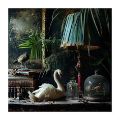 two white swans sitting on top of a table next to a potted palm tree