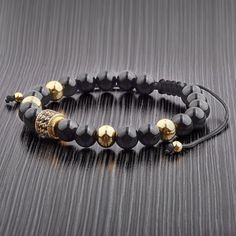 This Stone Bead Bracelet Secures And Adjusts With A Shocker Tie Knot Closure. Gold Teeth, Black Onyx Bracelet, Men's Bracelets, Onyx Bracelet, Men's Bracelet, Onyx Bead, Mens Accessories Jewelry, Shoe Lace Patterns, Jewelry Online Shopping