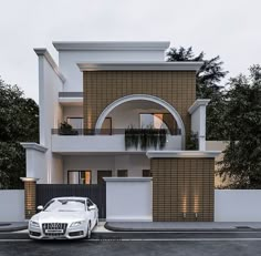 a white car parked in front of a house