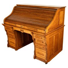 an old fashioned wooden desk with drawers