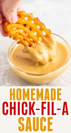 homemade chicken - fil - a sauce in a glass bowl with a hand dipping it