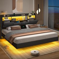 a bedroom with a bed, nightstands and lights on the floor in front of a window