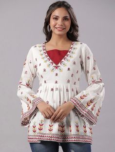 * Red & White Embroidered Cotton Dobby Tunic Printed Kurti / Embroidered Short Kurti / Indian Tunic / Summer-Spring Evening Dress / Cotton Tunic Tops Boho Tunic / Hippie Dress / Tribal Print Top * Red and White embroidered a-line kurti * Embroidered detailing  * Round neck, three-quarter, bell sleeves * Pure cotton *Fabric:-  Cotton Donny *Wash Care:-  Hand-wash AVAILABLE IN 6 SIZES THEY ARE IN FOLLOWING MEASUREMENTS IN INCHES:- XS:- Bust-34/Waist-28/Length-29 S:- Bust-36/Waist-30/Length-29 M:- Bust-38/Waist-32/Length-29 L:- Bust-40/Waist-34/Length-29 XL:- Bust-42/Waist-36/Length-29 XXL:- Bust-44/Waist-38/Length-29 NOTE ►►CUSTOMISATION We do customisation ️ ►►TRACKING We give full tracking to our valuable customers, you can track your package any time with tracking code provided by our sho White Embroidered V-neck Kurta, Traditional V-neck Blouse With Printed Motifs, Festive Cotton V-neck Top, Cotton Floral Embroidered V-neck Sets, Festive Anarkali Tops For Spring, Festive Anarkali V-neck Top, Fitted Straight Kurta With Floral Embroidery, Fitted Floral Embroidery Straight Kurta Top, Fitted Floral Embroidered Straight Kurta