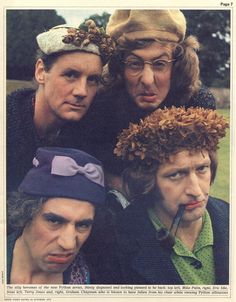 three men with hats on their heads posing for the camera