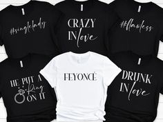 four t - shirts that say crazy in love, he put a ring on it and he put a drink in it