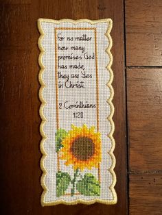 a cross stitch sunflower with the words for no matter how many purposes god has made, they are at christ