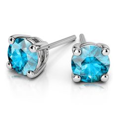 These alluring round cut aquamarine gemstone stud earrings are held in a platinum four-prong setting. Each light blue gemstone measures 7.5 mm, with an approximate 2 1/3 carat total weight. Proudly made in the USA. Amethyst Earrings Studs, Light Blue Gemstone, Gold Diamond Stud Earrings, Aquamarine Studs, Gold Diamond Earrings Studs, Gold Diamond Studs, Amethyst Studs, Gemstone Stud Earrings, Aquamarine Stone