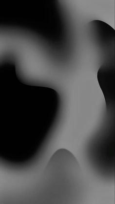 an abstract black and white background with wavy shapes