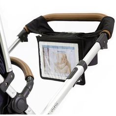 a baby stroller with an infant's picture on the front and back side