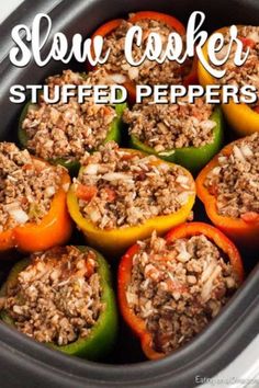 slow cooker stuffed peppers in a crock pot with the words slow cooker stuffed peppers