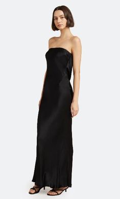 Sleek Floor-length Bias Cut Gown, Sleek Floor-length Slip Dress For Gala, Sleek Full-length Bias-cut Maxi Dress, Sleek Floor-length Bias Cut Dress, Sleek Maxi Dress For Night Out, Sleek Bias Cut Floor-length Dress, Black Bias Cut Maxi Slip Dress, Sleek Bias Cut Slip Dress For Evening, Silk Fitted Maxi Dress For Black-tie Events