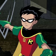 the animated character is dressed in green and yellow gloves, with his arms outstretched out