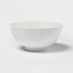 a white bowl sitting on top of a table