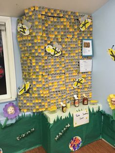 there is a display with bees on it